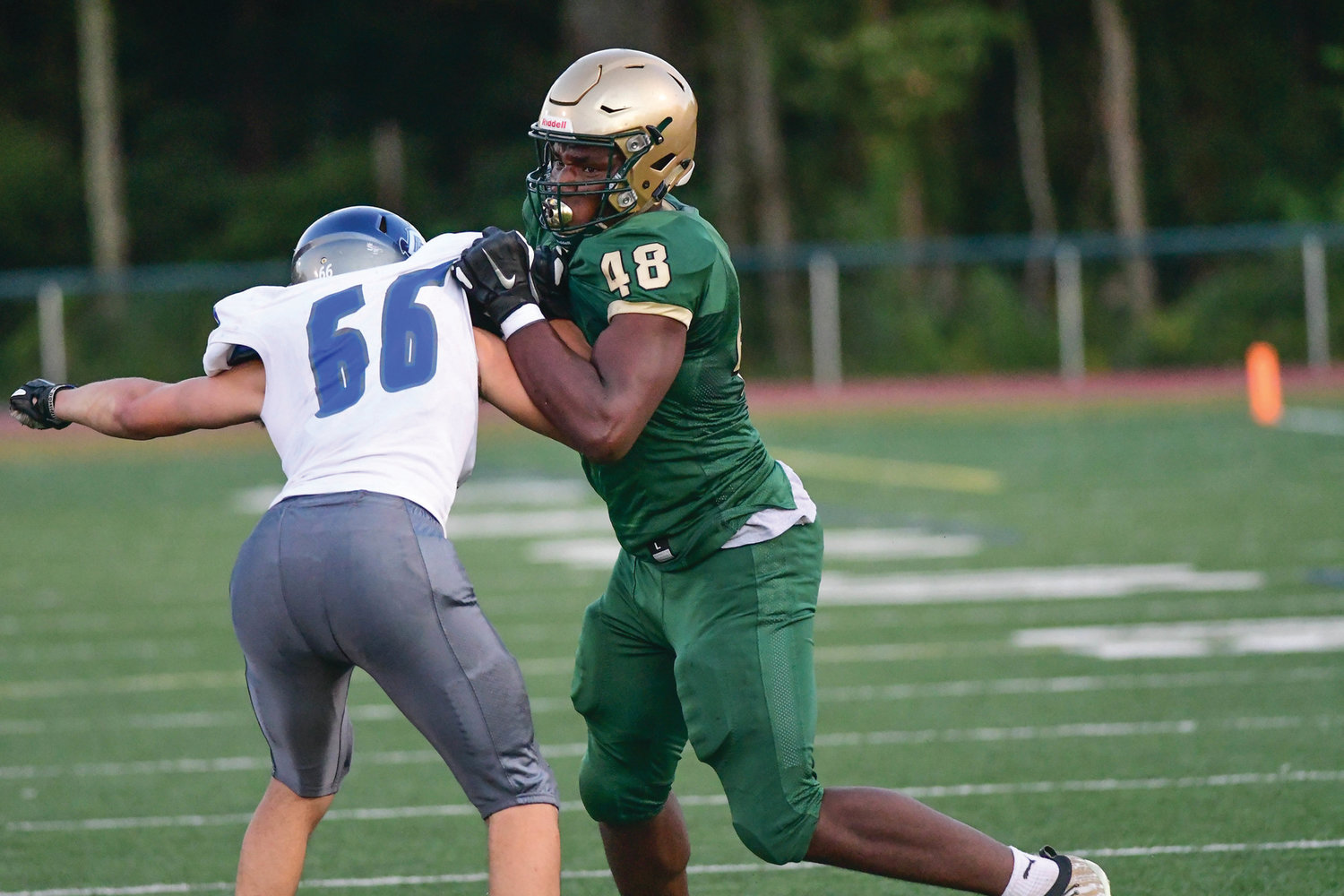 MAKING MOVES: Hendricken’s Jason Onye sheds a block during a game last season. Onye has verbally committed
to play for Notre Dame starting in 2021, citing the university’s similarities with Hendricken.